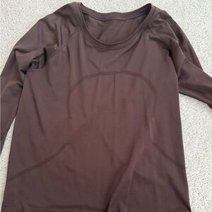 Women's Brown Long Sleeve Top
Size 10 worn only a few times